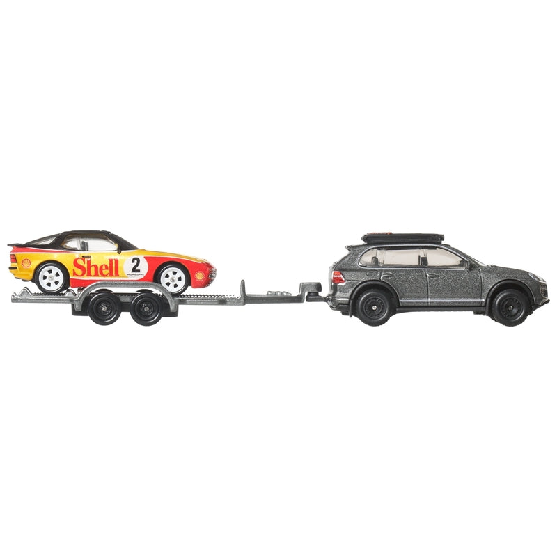 Porsche Cayenne towing 944 Turbo on trailer