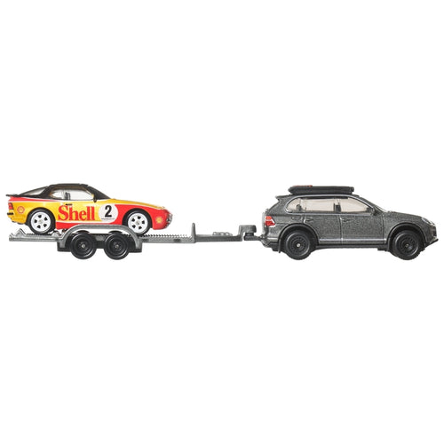 Porsche Cayenne towing 944 Turbo on trailer