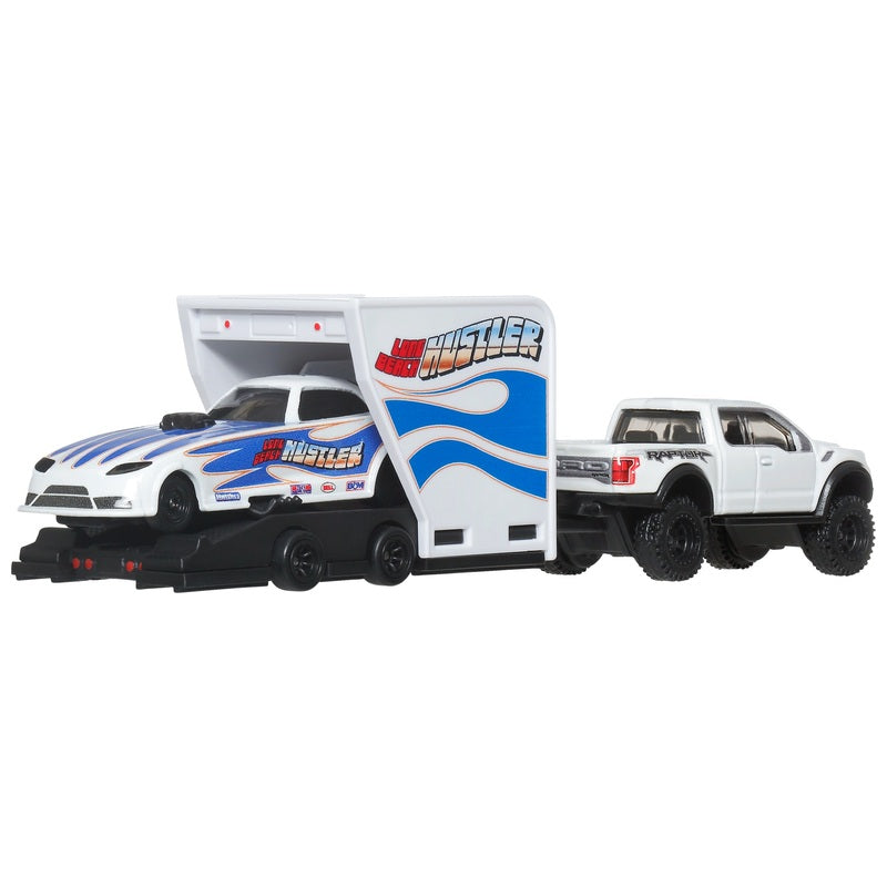 Rob'n Pinks and Ford F-150 Raptor rear view